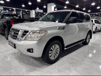 Nissan  Patrol  XE  2014  Automatic  352,000 Km  6 Cylinder  Four Wheel Drive (4WD)  SUV  Silver