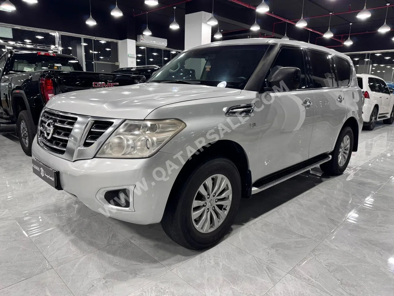 Nissan  Patrol  XE  2014  Automatic  352,000 Km  6 Cylinder  Four Wheel Drive (4WD)  SUV  Silver