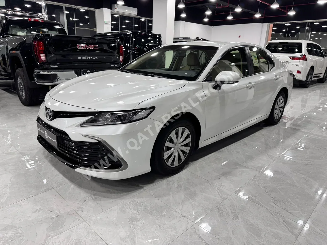 Toyota  Camry  LE  2024  Automatic  31,000 Km  4 Cylinder  Front Wheel Drive (FWD)  Sedan  White  With Warranty