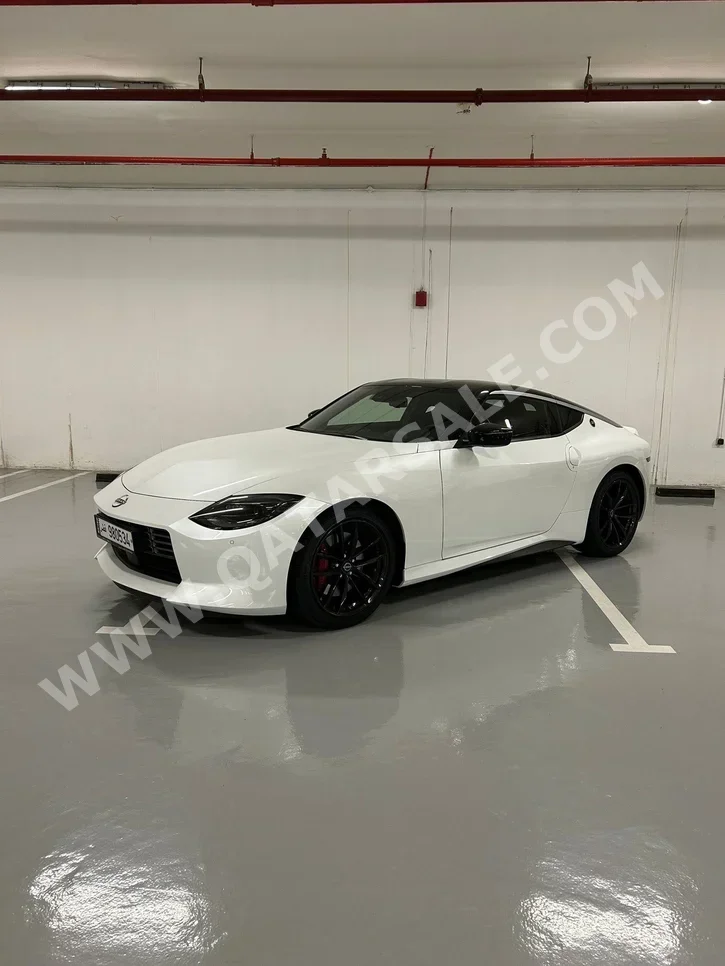 Nissan  Z  2024  Automatic  200 Km  6 Cylinder  Rear Wheel Drive (RWD)  Coupe / Sport  White  With Warranty