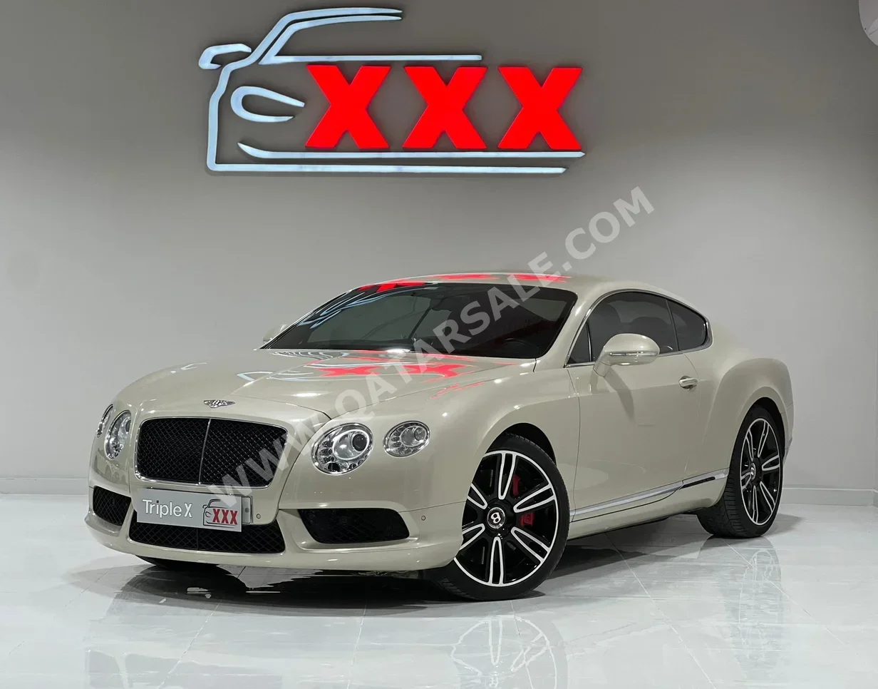Bentley  Continental  GT  2014  Automatic  42,000 Km  8 Cylinder  All Wheel Drive (AWD)  Coupe / Sport  White Sand