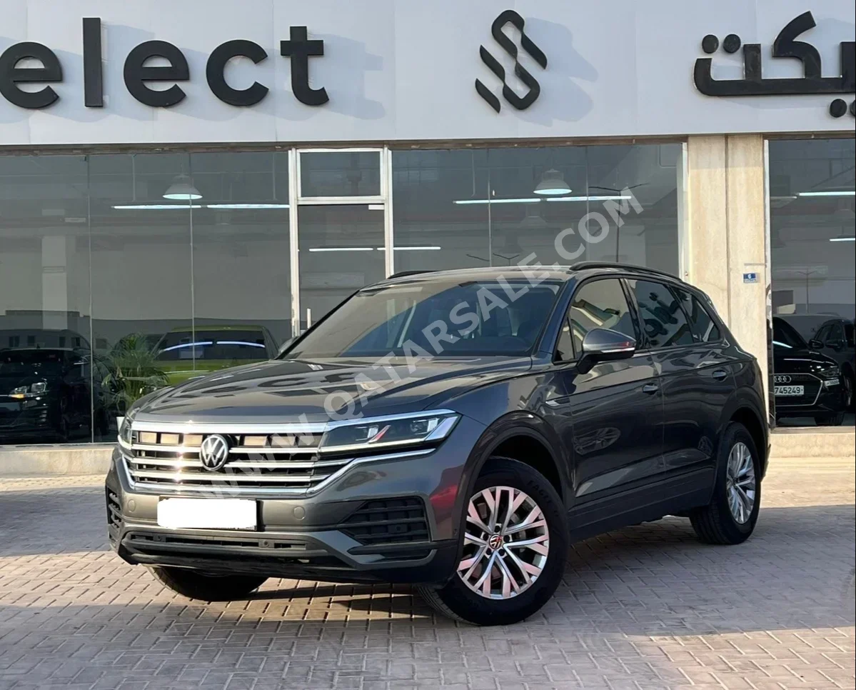 فوكس واغن  طوارق  2023  اوتوماتيك  37,000 كم  4 سلندر  دفع كلي مستمر  اس يو في  رمادي  تحت الضمان