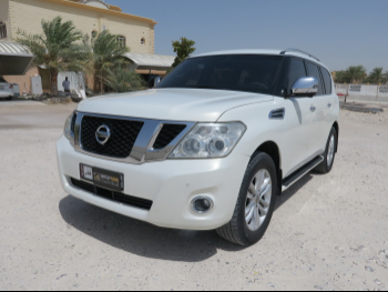 نيسان  باترول  ال اي  2012  اوتوماتيك  327,000 كم  8 سلندر  دفع رباعي  اس يو في  أبيض لؤلؤي