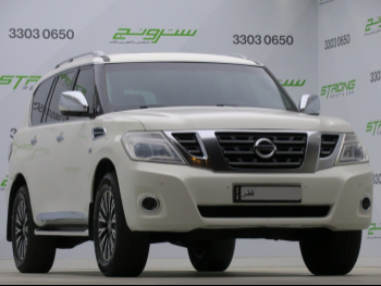 Nissan  Patrol  SE  2013  Automatic  212,000 Km  8 Cylinder  Four Wheel Drive (4WD)  SUV  White