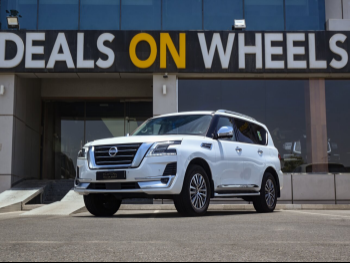 Nissan  Patrol  Platinum  2020  Automatic  135,000 Km  6 Cylinder  Four Wheel Drive (4WD)  SUV  White