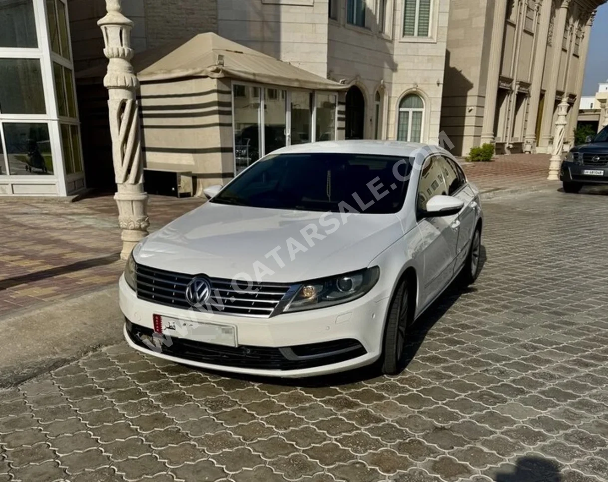 Volkswagen  Passat  CC  2015  Automatic  129,000 Km  4 Cylinder  Front Wheel Drive (FWD)  Sedan  White