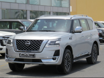 Nissan  Patrol  Platinum  2024  Automatic  48,000 Km  6 Cylinder  Four Wheel Drive (4WD)  SUV  Silver  With Warranty