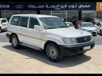 Toyota  Land Cruiser  GX  2000  Manual  441,000 Km  6 Cylinder  Four Wheel Drive (4WD)  SUV  White