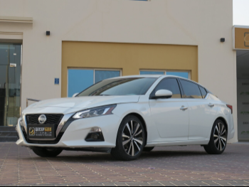 Nissan  Altima  2022  Automatic  65,000 Km  4 Cylinder  Front Wheel Drive (FWD)  Sedan  White