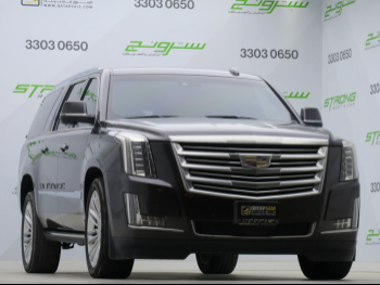 Cadillac  Escalade  2015  Automatic  191,000 Km  8 Cylinder  Four Wheel Drive (4WD)  SUV  Gray