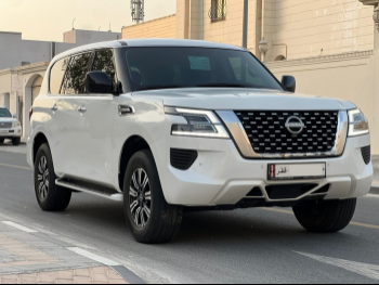 Nissan  Patrol  XE  2023  Automatic  51,000 Km  6 Cylinder  Four Wheel Drive (4WD)  SUV  White  With Warranty