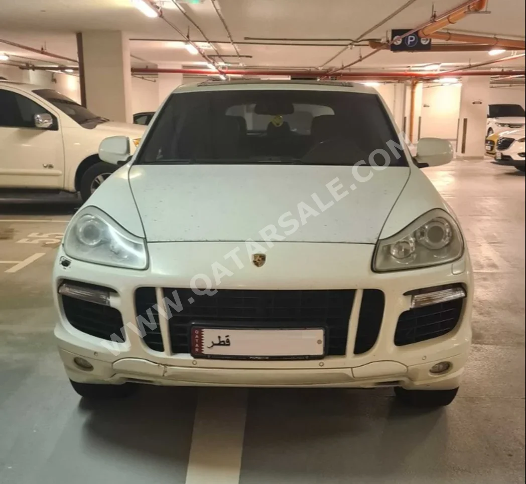 Porsche  Cayenne  Turbo  2009  Automatic  193,000 Km  8 Cylinder  Four Wheel Drive (4WD)  SUV  White