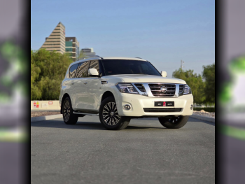 Nissan  Patrol  LE  2014  Automatic  202,000 Km  8 Cylinder  Four Wheel Drive (4WD)  SUV  White