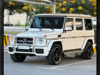Mercedes-Benz  G-Class  63 AMG  2015  Automatic  80,000 Km  8 Cylinder  Four Wheel Drive (4WD)  SUV  White