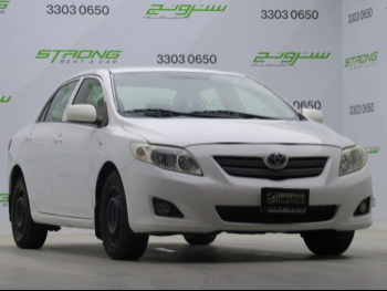 Toyota  Corolla  2010  Automatic  188,000 Km  4 Cylinder  Front Wheel Drive (FWD)  Sedan  White