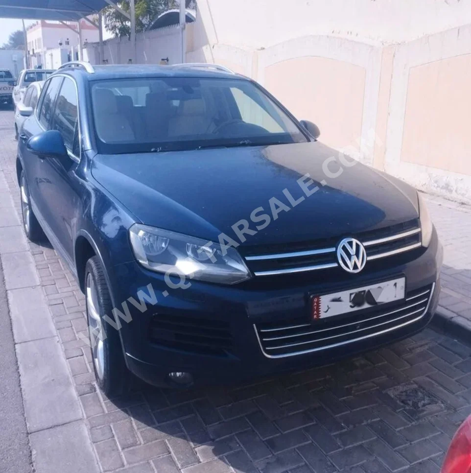 Volkswagen  R-Line  2011  Automatic  200,000 Km  6 Cylinder  Four Wheel Drive (4WD)  SUV  Dark Blue