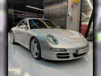 Porsche  911  Carrera S  2007  Automatic  85,000 Km  6 Cylinder  Rear Wheel Drive (RWD)  Coupe / Sport  Silver
