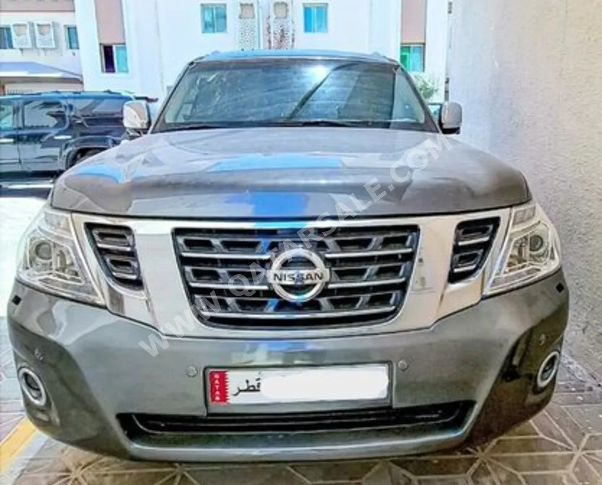 Nissan  Patrol  Platinum  2014  Automatic  175,000 Km  8 Cylinder  Four Wheel Drive (4WD)  SUV  Dark Gray