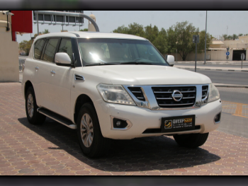 Nissan  Patrol  SE  2014  Automatic  210,000 Km  8 Cylinder  Four Wheel Drive (4WD)  SUV  Pearl