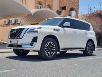 Nissan  Patrol  Platinum  2012  Automatic  110,000 Km  8 Cylinder  Four Wheel Drive (4WD)  SUV  White