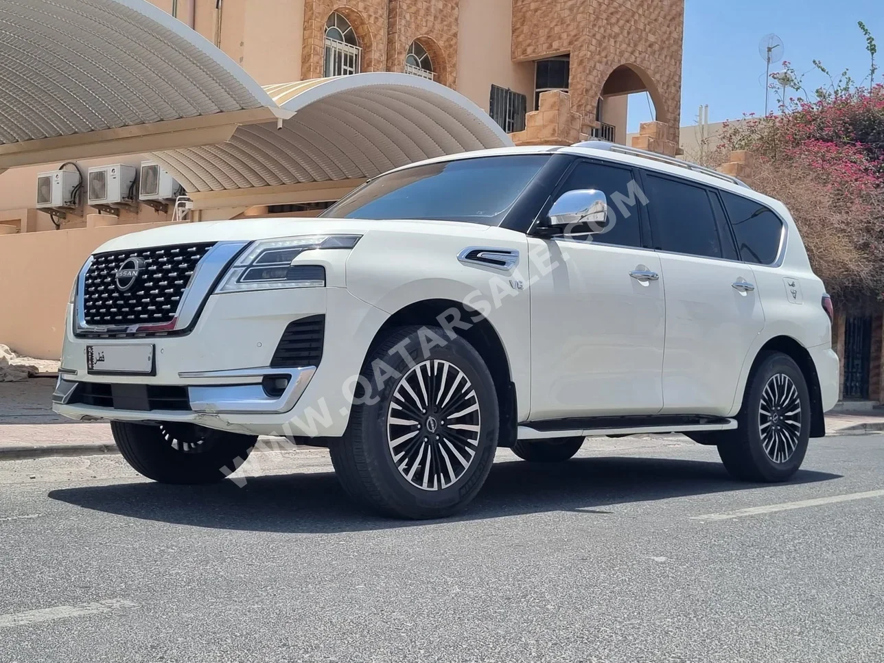 Nissan  Patrol  Platinum  2012  Automatic  110,000 Km  8 Cylinder  Four Wheel Drive (4WD)  SUV  White