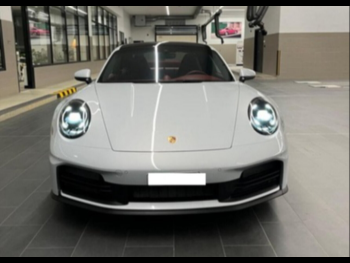 Porsche  911  2025  Automatic  750 Km  6 Cylinder  Rear Wheel Drive (RWD)  Coupe / Sport  Gray  With Warranty