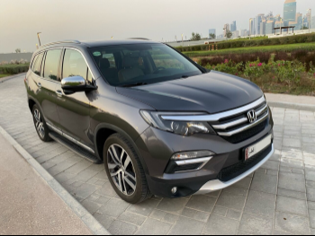 Honda  Pilot  Touring  2016  Automatic  93,000 Km  6 Cylinder  All Wheel Drive (AWD)  SUV  Gray