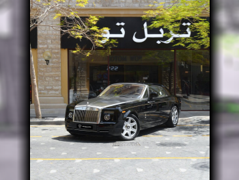 Rolls-Royce  Phantom  2009  Automatic  39,765 Km  12 Cylinder  All Wheel Drive (AWD)  Coupe / Sport  Black