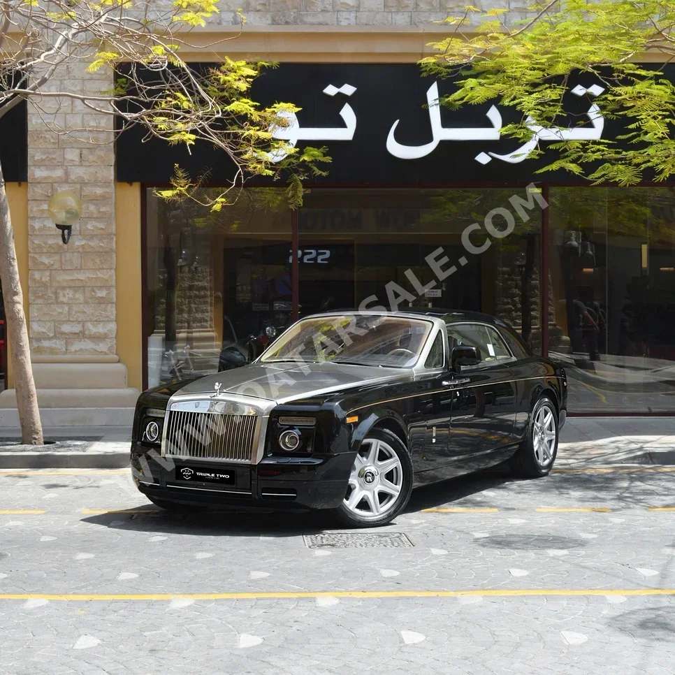 Rolls-Royce  Phantom  2009  Automatic  39,765 Km  12 Cylinder  All Wheel Drive (AWD)  Coupe / Sport  Black