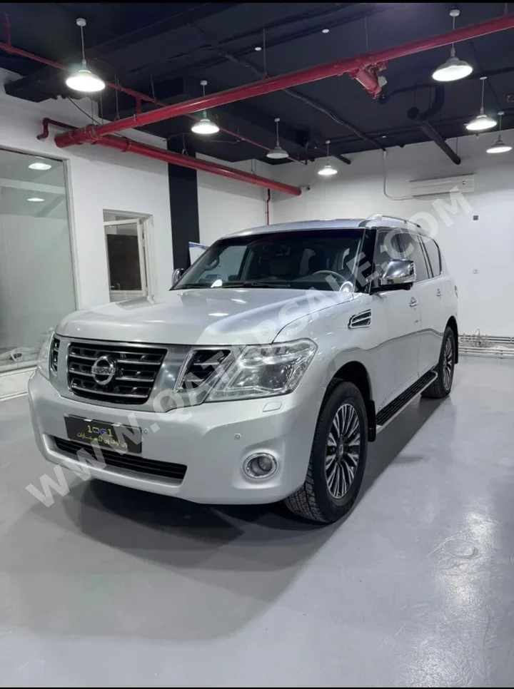 Nissan  Patrol  Platinum  2017  Automatic  215,000 Km  8 Cylinder  Four Wheel Drive (4WD)  SUV  Silver