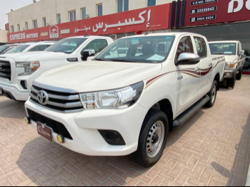 Toyota  Hilux  2019  Automatic  36,000 Km  4 Cylinder  Four Wheel Drive (4WD)  Pick Up  White
