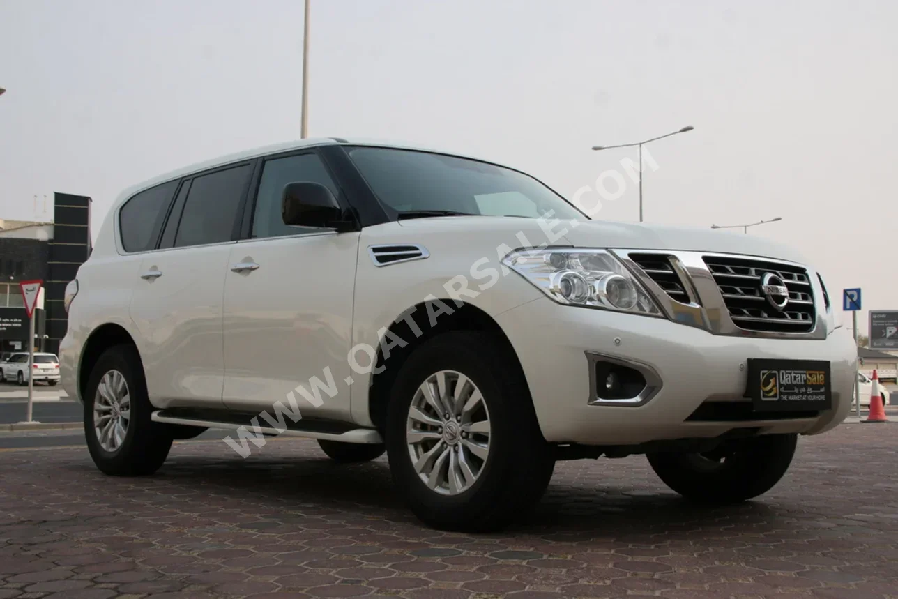 Nissan  Patrol  XE  2019  Automatic  135,000 Km  6 Cylinder  Four Wheel Drive (4WD)  SUV  White