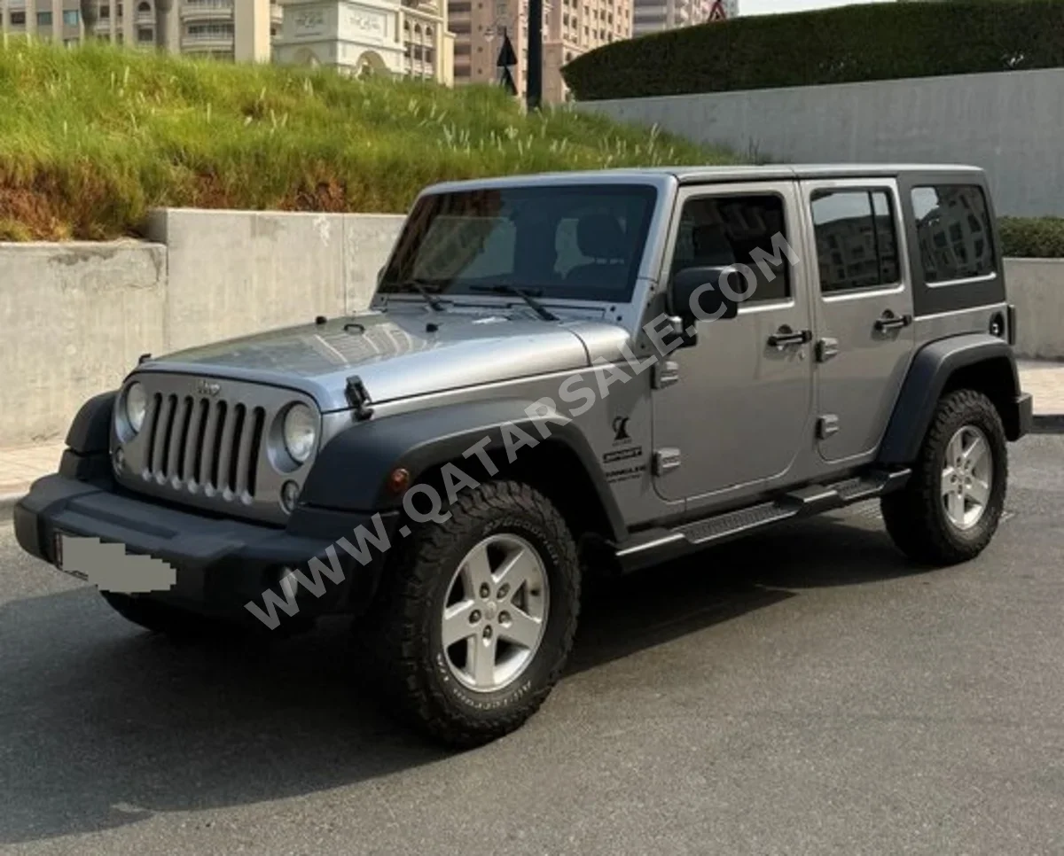 Jeep  Wrangler  Sport  2015  Automatic  140,000 Km  6 Cylinder  Four Wheel Drive (4WD)  SUV  Gray
