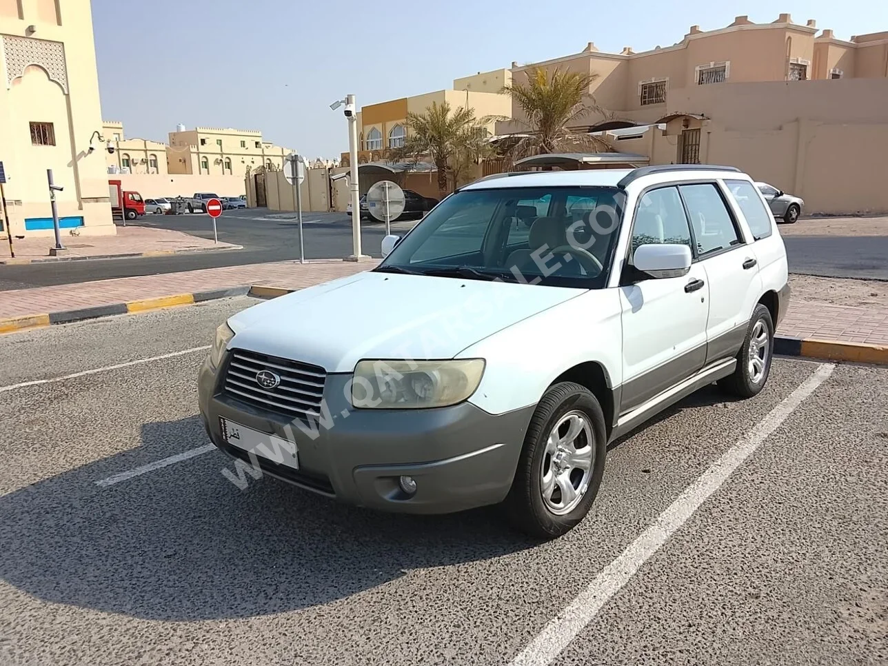 Subaru  Forester  2006  Automatic  240,000 Km  4 Cylinder  Four Wheel Drive (4WD)  SUV  White