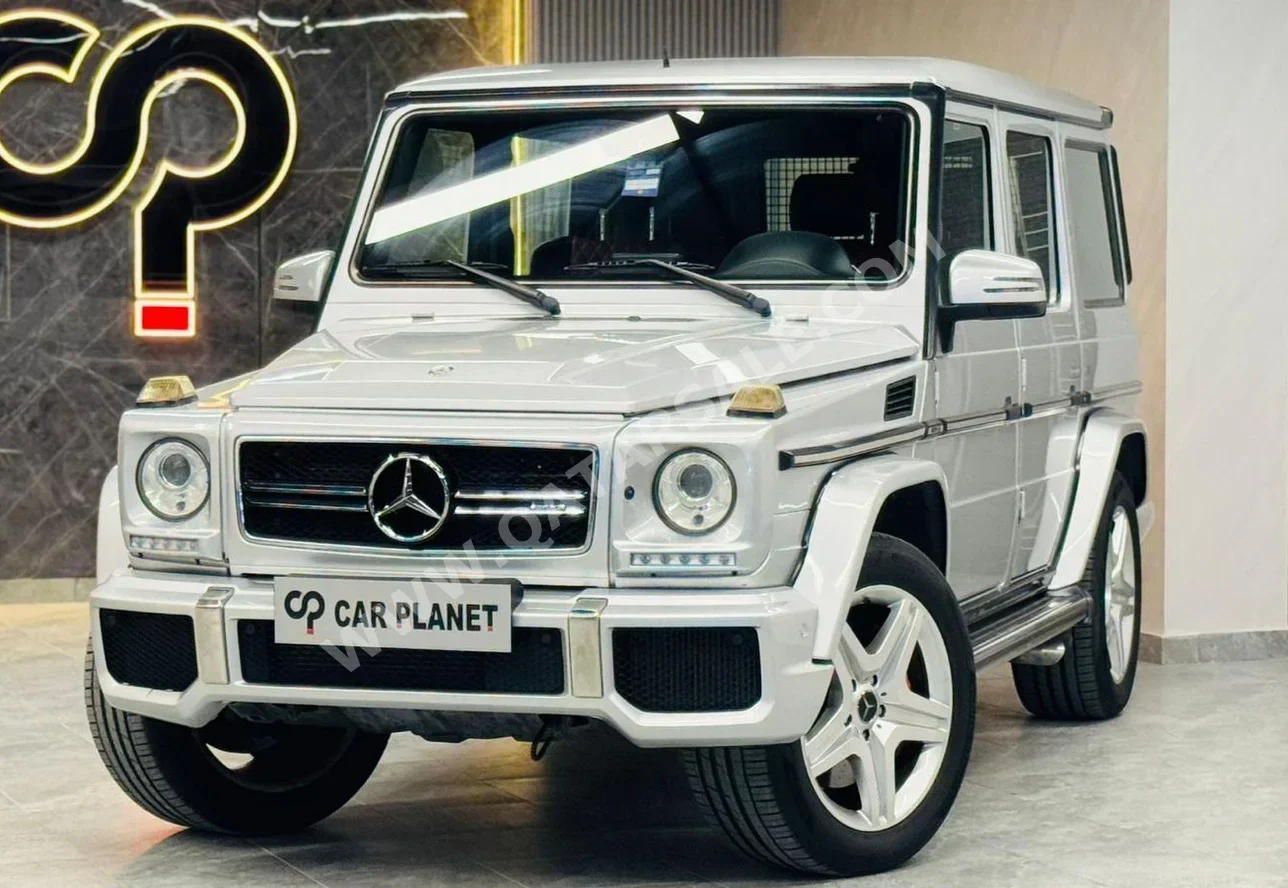 Mercedes-Benz  G-Class  63 AMG  2015  Automatic  87,000 Km  8 Cylinder  Four Wheel Drive (4WD)  SUV  Silver