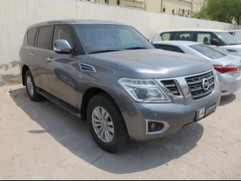 Nissan  Patrol  SE  2015  Automatic  380,000 Km  8 Cylinder  Four Wheel Drive (4WD)  SUV  Gray