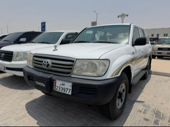 Toyota  Land Cruiser  GX  2006  Manual  400,000 Km  6 Cylinder  Four Wheel Drive (4WD)  SUV  White