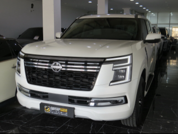 Nissan  Patrol  Platinum  2025  Automatic  10,000 Km  6 Cylinder  Four Wheel Drive (4WD)  SUV  White  With Warranty