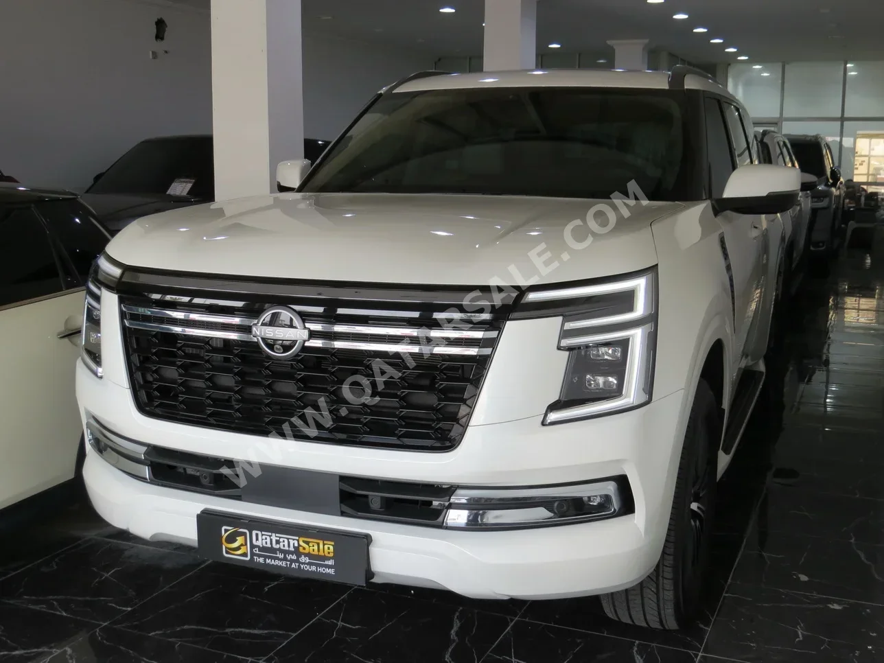 Nissan  Patrol  Platinum  2025  Automatic  10,000 Km  6 Cylinder  Four Wheel Drive (4WD)  SUV  White  With Warranty