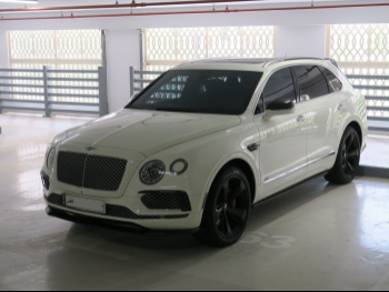 Bentley  Bentayga  2018  Automatic  46,000 Km  12 Cylinder  Four Wheel Drive (4WD)  SUV  White