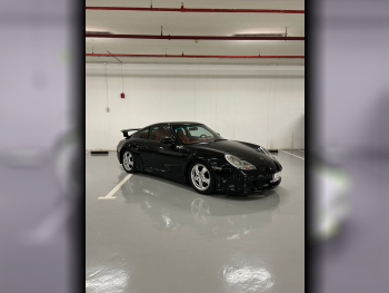 Porsche  911  Carrera  1998  Manual  127,000 Km  6 Cylinder  Rear Wheel Drive (RWD)  Coupe / Sport  Black