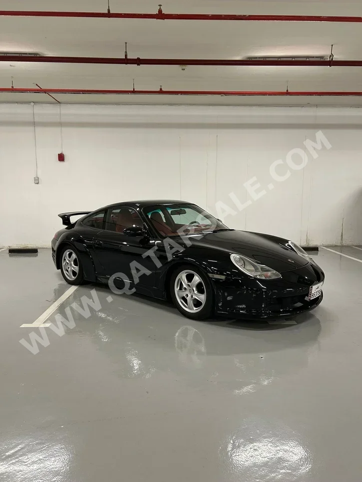 Porsche  911  Carrera  1998  Manual  127,000 Km  6 Cylinder  Rear Wheel Drive (RWD)  Coupe / Sport  Black