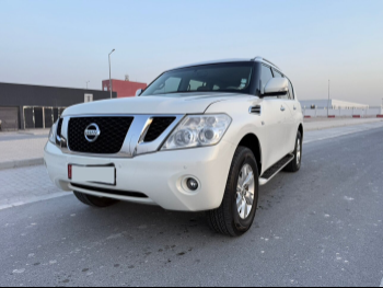 Nissan  Patrol  SE  2013  Automatic  76,000 Km  8 Cylinder  Four Wheel Drive (4WD)  SUV  White