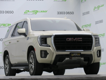 GMC  Yukon  SLE  2021  Automatic  44,000 Km  8 Cylinder  Four Wheel Drive (4WD)  SUV  Gold