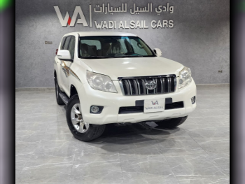 Toyota  Prado  TXL  2011  Automatic  350,000 Km  6 Cylinder  Four Wheel Drive (4WD)  SUV  White