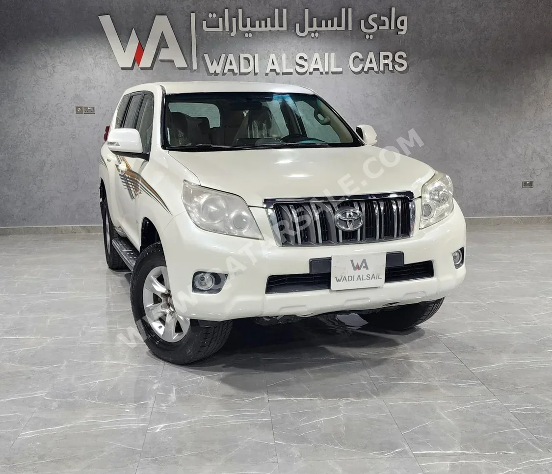 Toyota  Prado  TXL  2011  Automatic  350,000 Km  6 Cylinder  Four Wheel Drive (4WD)  SUV  White