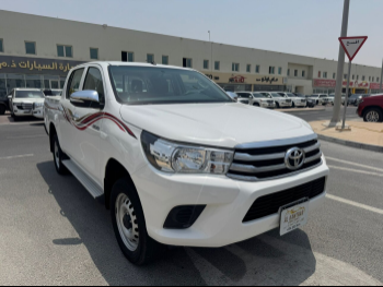 Toyota  Hilux  2021  Automatic  88,000 Km  4 Cylinder  Four Wheel Drive (4WD)  Pick Up  White