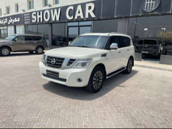 Nissan  Patrol  Platinum  2014  Automatic  206,000 Km  8 Cylinder  Four Wheel Drive (4WD)  SUV  White