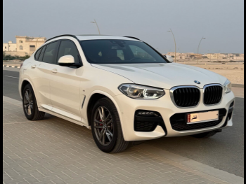 BMW  X-Series  X4  2021  Automatic  94,000 Km  4 Cylinder  Four Wheel Drive (4WD)  SUV  White  With Warranty