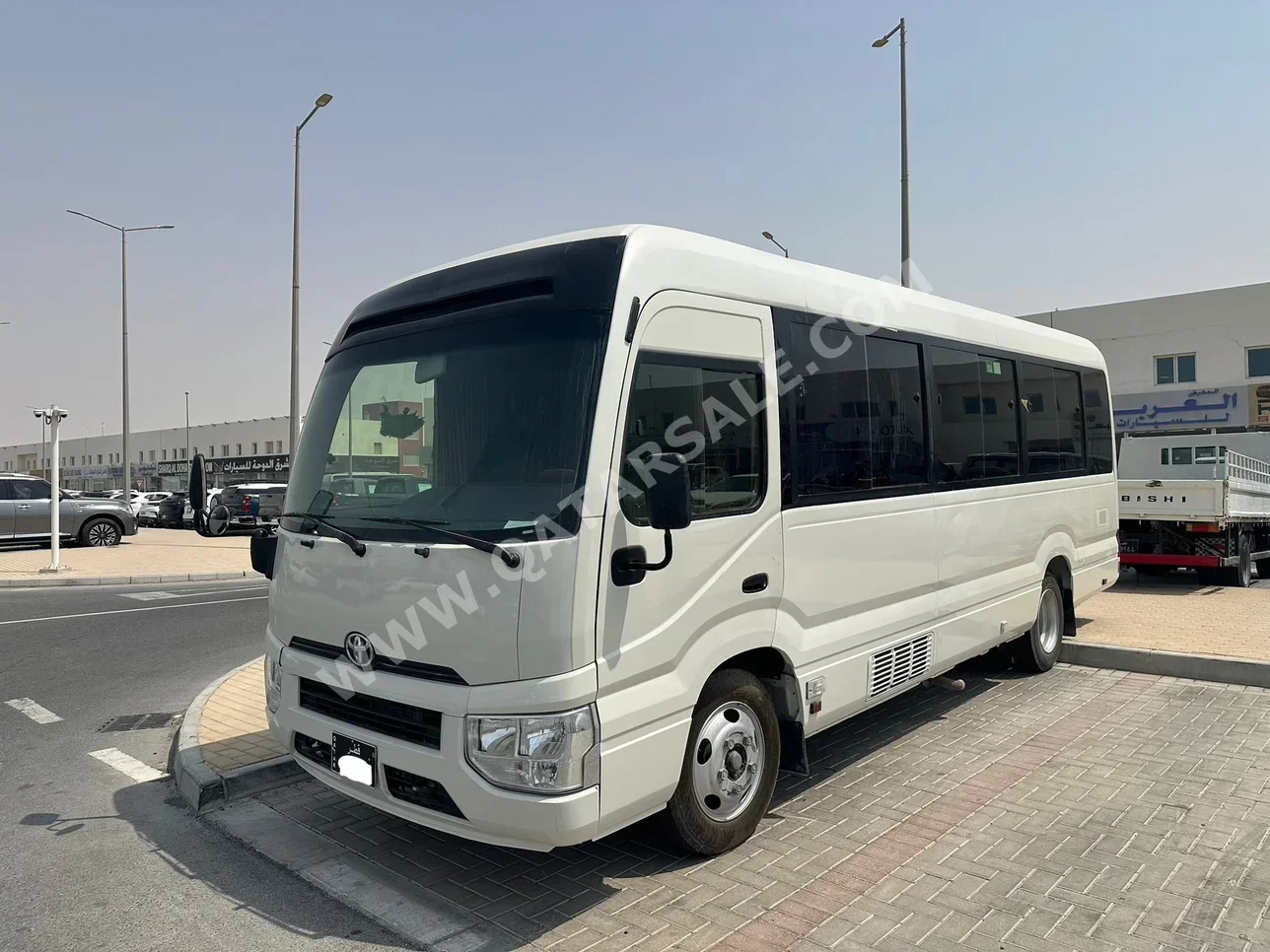 Toyota  Coaster  2023  Automatic  51,000 Km  4 Cylinder  Rear Wheel Drive (RWD)  Van / Bus  White
